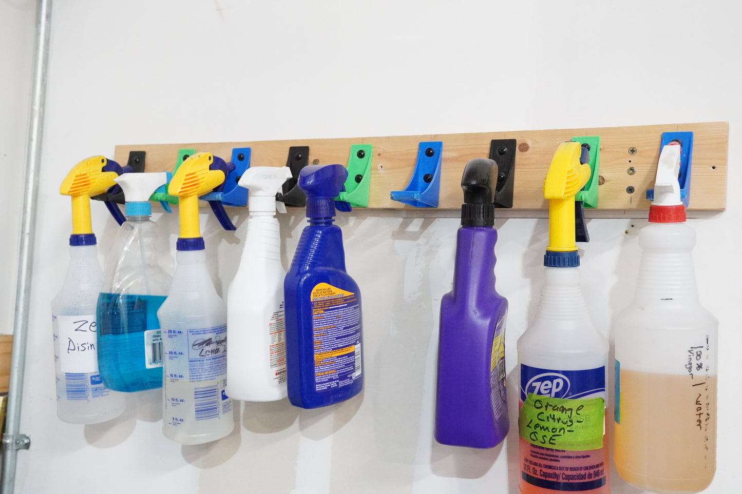 The SprayDock spray bottle wall mounted rack