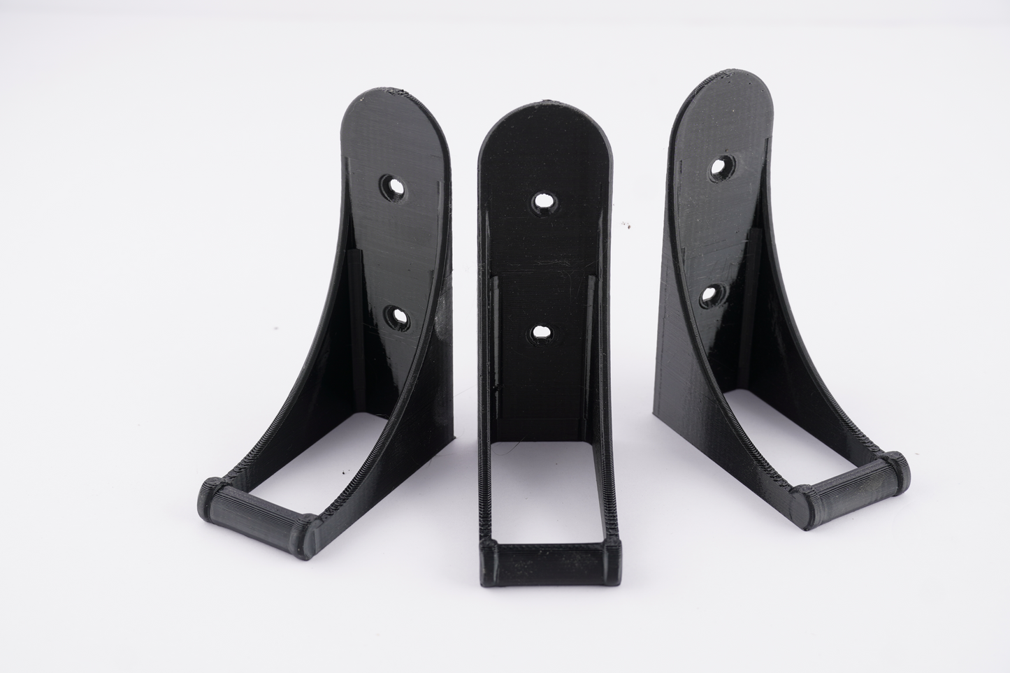 The SprayDock spray bottle wall mounted rack