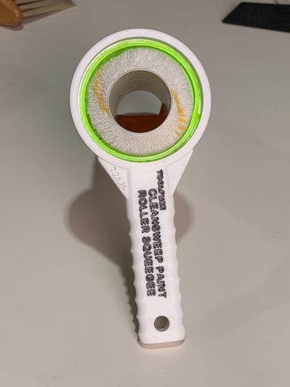 CleanSweep Flex flexible TPU ring fitted around a paint roller cover