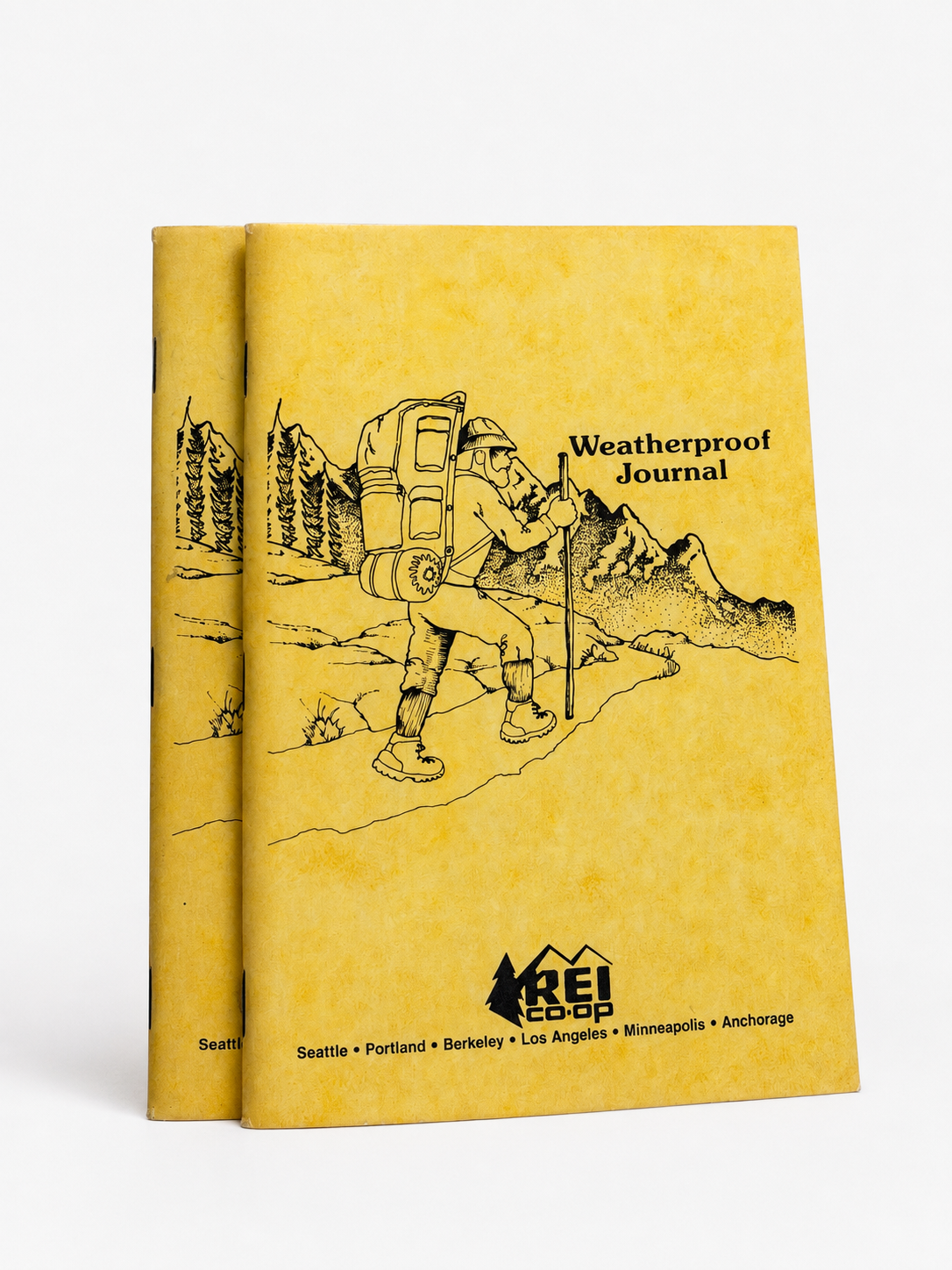 Vintage yellow REI Co-op weatherproof journals
